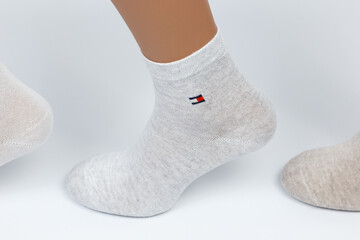 Socks on a white background. Socks on the leg.