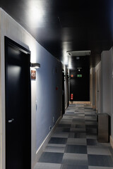 Interior Corridor of a Hotel with Nobody and Closed Door