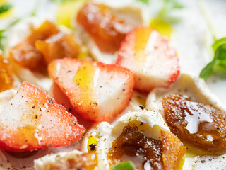 Cream cheese and fresh strawberries close-up