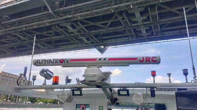 Moscow , Russia &ndash; 06 14 2022: JRC Alphatron ship radar on boat under bridge. Vessel navigation system on river