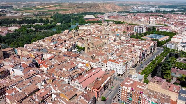 City of Logrono perspective from above. View of old town center with beautiful Concatedral de Santa Mar&iacute;a de la Redonda. Drone forward creating a panoramic view of the city. In background Ebro River