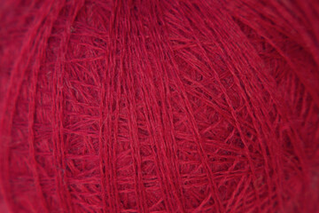 wool yarn for knitting burgundy color, fur texture, abstract backgrounds