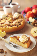 Apple pie with walnuts - typical autumn dish	