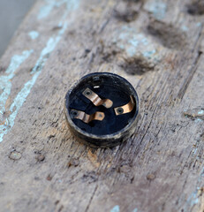 Headlight plastic cover with brass contacts