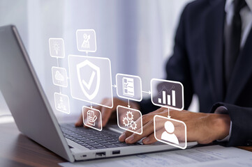 Businessman using computer  document for life insurance investment concept, Insurance concept business planning background, Home insurance sign