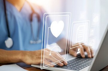 Doctor using technology document management on computer system management for cardiologist Specialist in treating heart disease for treatment in hospital , DMS document management concept - obrazy, fototapety, plakaty