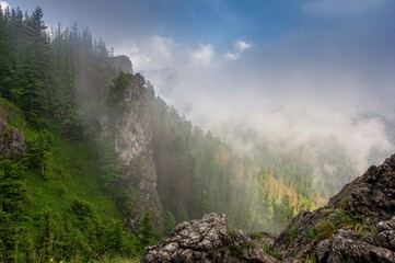 Mount Nosal in the Tatra National Park in Poland. Rocky mountain in Polish Tatra mountains. Beautiful green forests. View towards Kasprowy Wierch peak