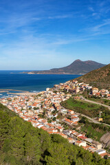 Obraz premium Town on the sea coast, Buggerru, Sardinia, Italy. Sunny Fall Season Day.