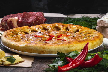 Ossetian pie with meat on the table