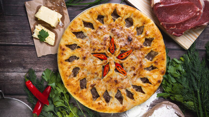 Ossetian pie with meat on the table