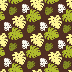 Seamless pattern with yellow and green monstera leaves on a brown background. Vector image.