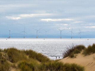 Off shore wind turbines in the sea off Formby Point Sefton Coast Merseyside