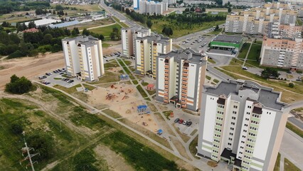 A new recently built neighborhood of apartment buildings. Drone video.