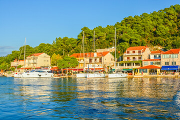 Boats docked in the small harbor at the picturesque fishing village of Govedari, Croatia, on the island of Mljet, along the Dalmatian Coast of Croatia.
