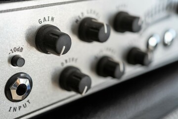 Guitar amplifier, an electronic device designed to amplify an electrical sound signal emitted by an electric guitar. Close-up