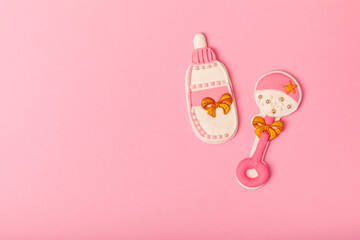 Baby shower cookies on a pink background. Delicious cookies for a baby party. Baby shower party concept. Flat lay. View from above. candy bar. Gender party.