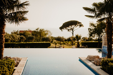 swimming pool at sunset
