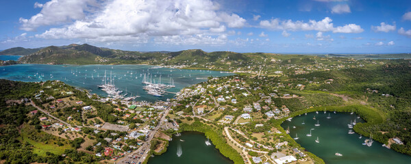 The drone aerial view of English Harbor and Falmouth Harbor, the southern coastline of Antigua.  
