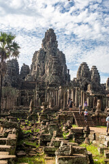 Siem Reap, complex of Angkor Wat, Angkor Thom, view of the archeological site with blue sky in the middle of the tropical forest. Sense of exploration in the ruins of an ancient civilization.