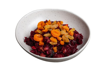 Beetroot salad with prunes in plate vegan food close-up on isolated png background