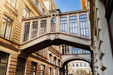 Ornamental bridges between buildings in Prague. Beautiful european architecture