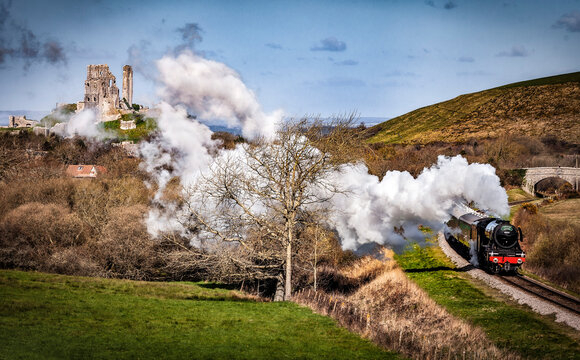 Flying Scotsman train in front of Corfe Casle Dorset