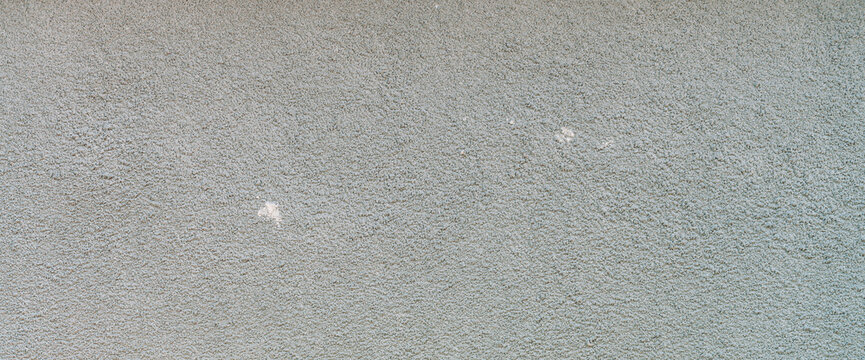 Simple Texture Of Foundation Of Old Building Of Crushed Stone Close-up. Minimalist Urban Background With Gravel Pattern. Full Frame Of Wall Close Up. Minimal Backdrop With Gray Foundation Of House.