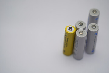 aa batteries on white background