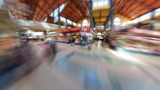 Timelapse from people walking inside Great Market Hall of Budapest