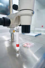 Workplace and laboratory devices of a genetics laboratory assistant