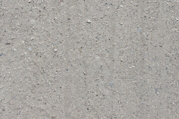 unpaved neighborhood road made out of coarse sand