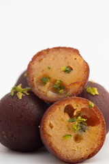 Traditional Ball Shaped Mithai Kala Jamun Or Dark Black Gulab Jamun Made Of Khova, Paneer, Cottage Cheese, Milk Solid, Khoya, Mawa, Cardamom, Mava, Kesar, Kewra Rose Water Dipped In Sugar Syrup Chasni