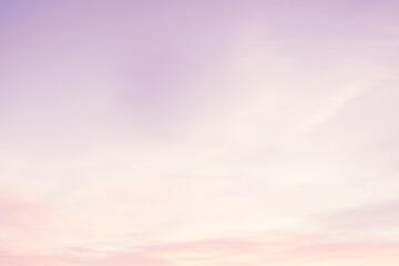 Sky with soft and fluffy pastel lilac pink and blue colored clouds. Sunset background. Nature. sunrise. Instagram toned style