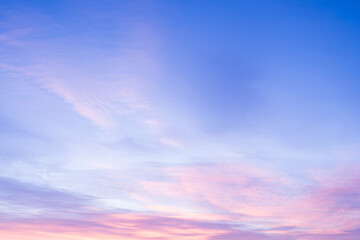 Sky with soft and fluffy pastel pink and blue colored clouds. Sunset background. Nature. sunrise. Instagram toned style