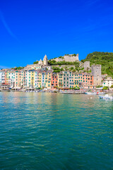 Fototapeta na wymiar View of City Porto Venere - Harbor at beautiful coast scenery - travel destination of Province of La Spezia - Italy