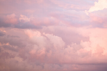 Sky with soft and fluffy pastel pink and blue colored clouds. Sunset background. Nature. sunrise. Instagram toned style
