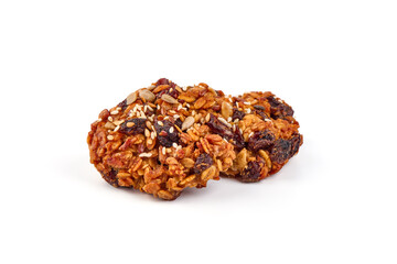 Homemade oat cookies with seeds, isolated on white background.