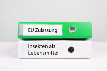 EU authorization, insects in food is standing in german language on the file folder, permission for...