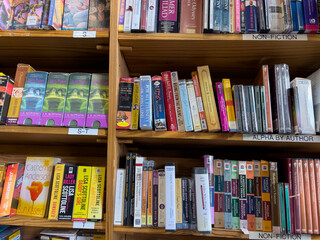 Fototapeta premium Redmond, WA USA - circa December 2022: Close up view of used audiobooks for sale inside a Half Price Bookstore.