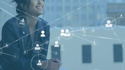 Animation of profile icons connected with lines over smiling asian businesswoman standing by railing - Powered by Adobe