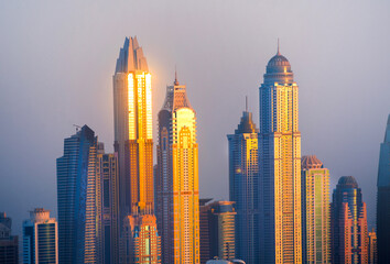 Fototapeta na wymiar Dubai, UAE. Dubai Marina skyscrapers at sunset 