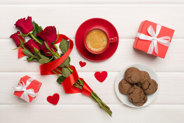 Gifts and breakfast for valentines day on table, top view