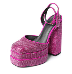 Fashionable punk square toe ankle strap pump isolated on white. Shiny party platform high heeled shoe