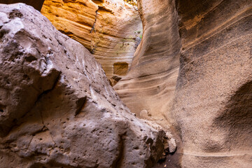 Escape to the nature - slot canyon with some rocks on the ground