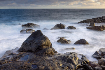 Magic sunrise at Punta de Silva with waves hitting the rocks.