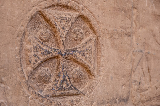 Old Knights Templar Christian Symbol on a Wall