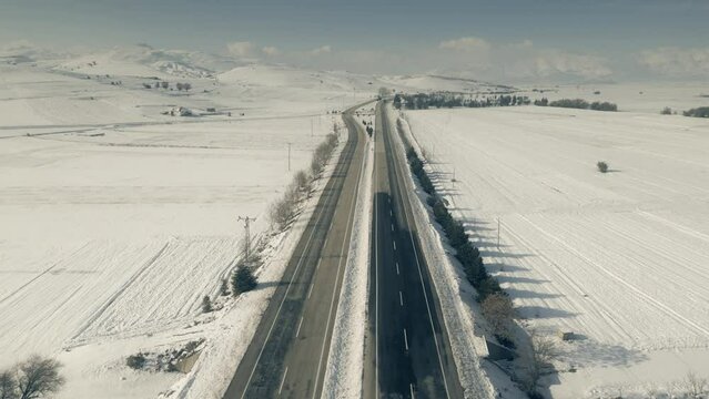 Aerial view of the highway in mountains in winter, Turkey
