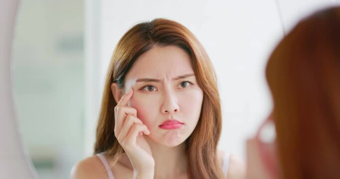 Woman worry about eyes wrinkles