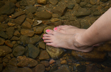 People go and soak their feet in the waterfall clear water and stone and breast of spring and enjoy autumn.