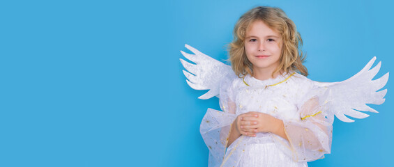 Angel child. Isolated studio shot. Cute kid with angel wings. Banner for website header design.